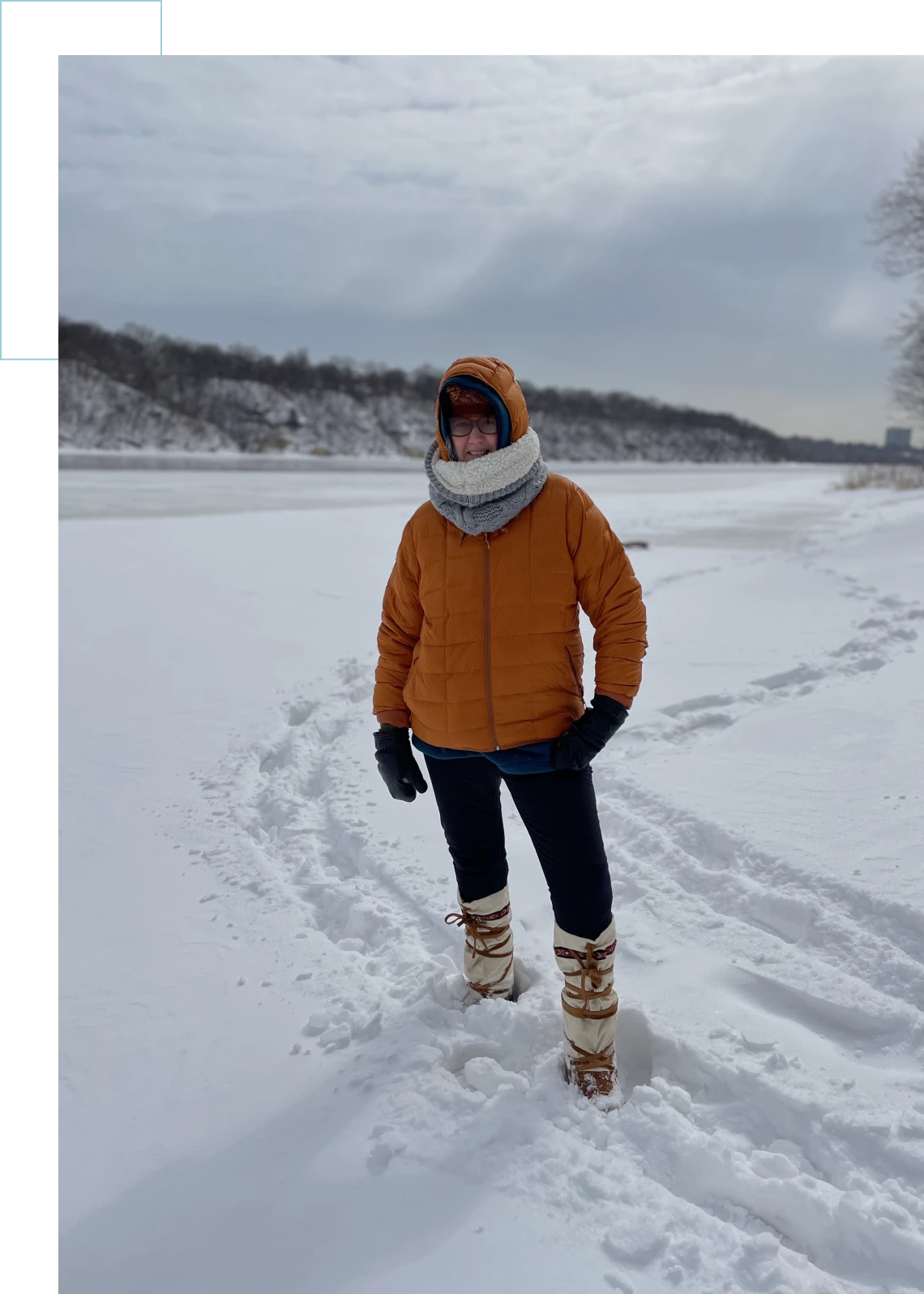 Winter walk by snowy river